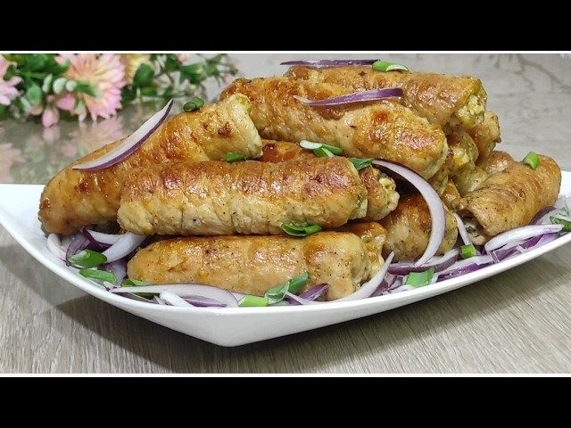 Сочные крученики с плавленым сыром: быстрая и сытная закуска