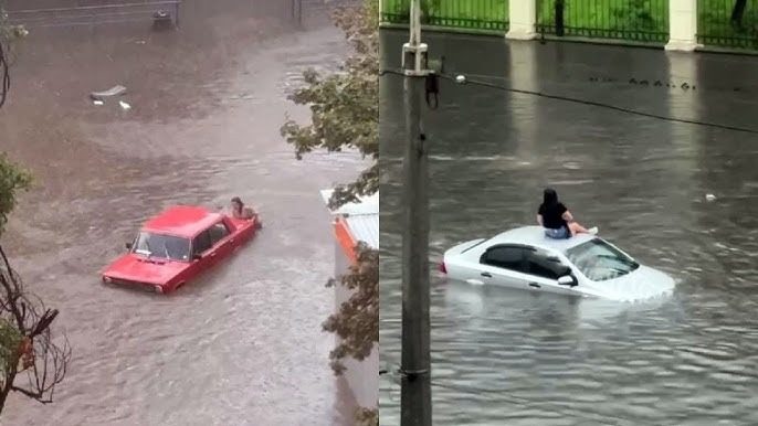 Потоп в Одессе: маршрутка с людьми провалилась под землю (видео)