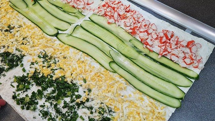 Сырные рулеты с крабовыми палочками: оригинальный рецепт